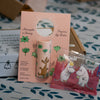Moomin Bundle klíčenka + balzám na rty + gumídci